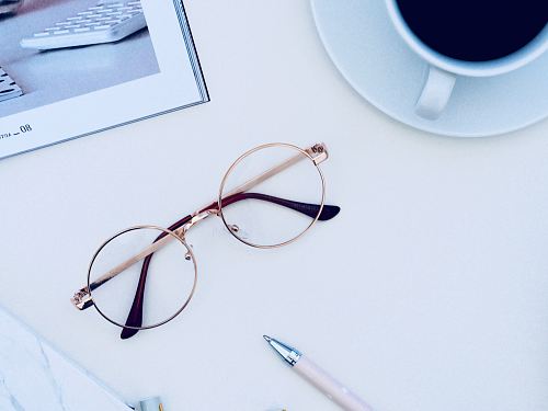 eyeglasses on white table